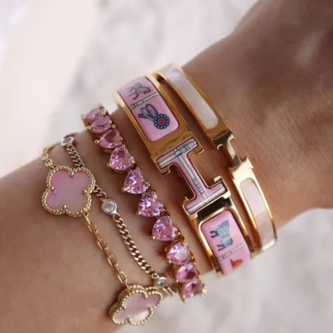 ARMBAND TENNIS MIT ROSA HERZ